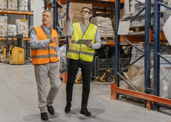 Man with tablet working logistic